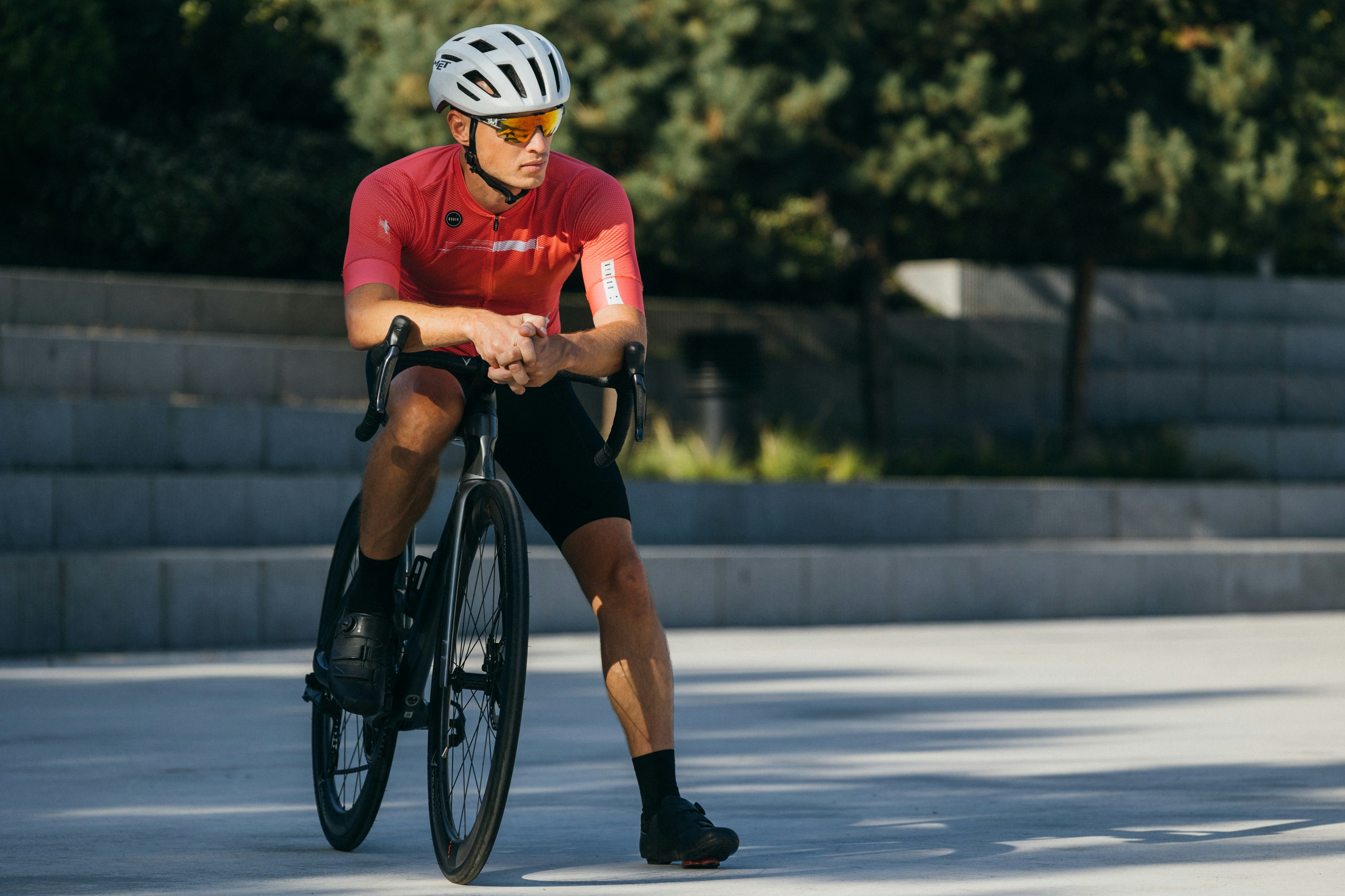 Cyclist riding a road bike outdoors in real conditions.