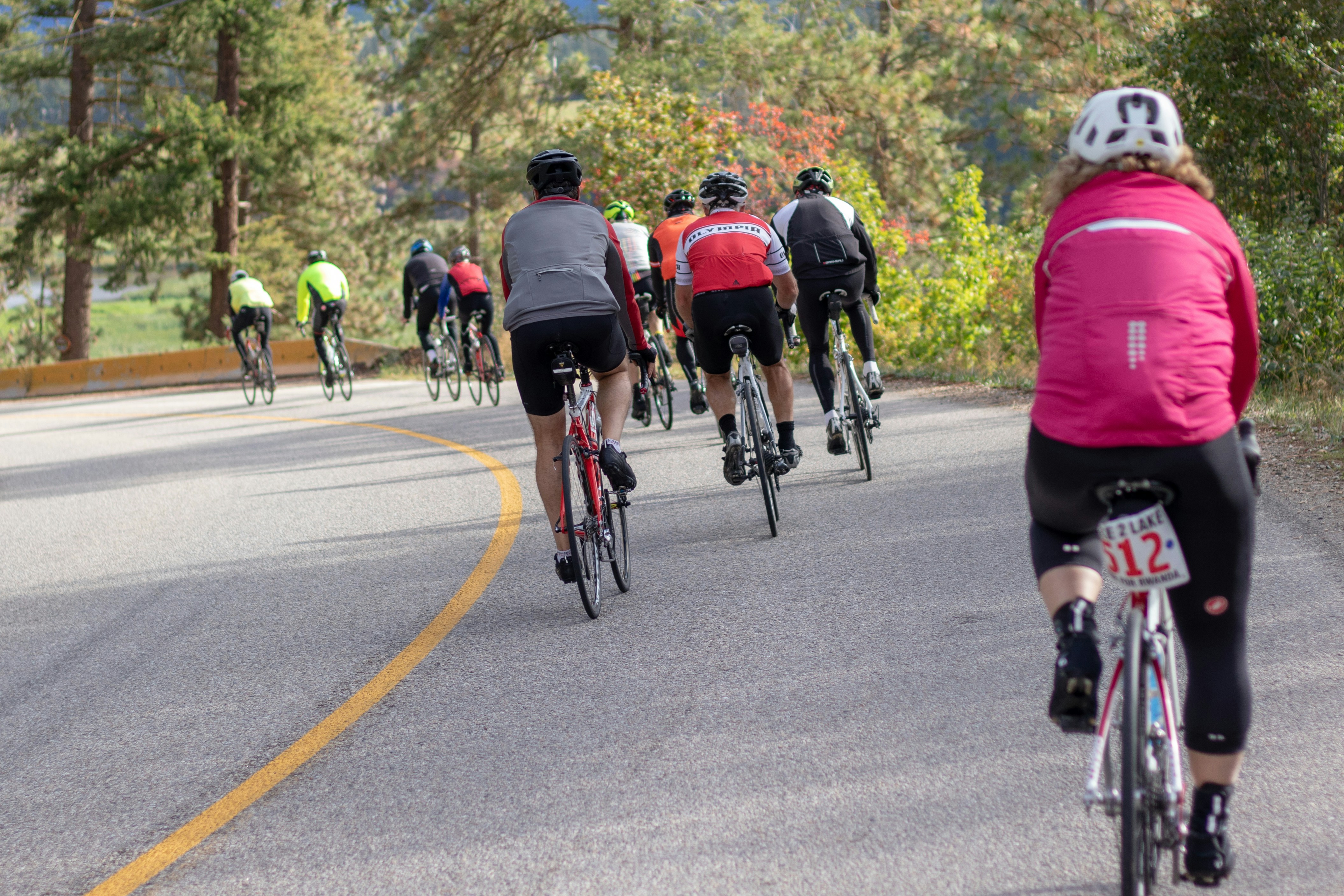 Cyclist riding a road bike outdoors in real conditions.