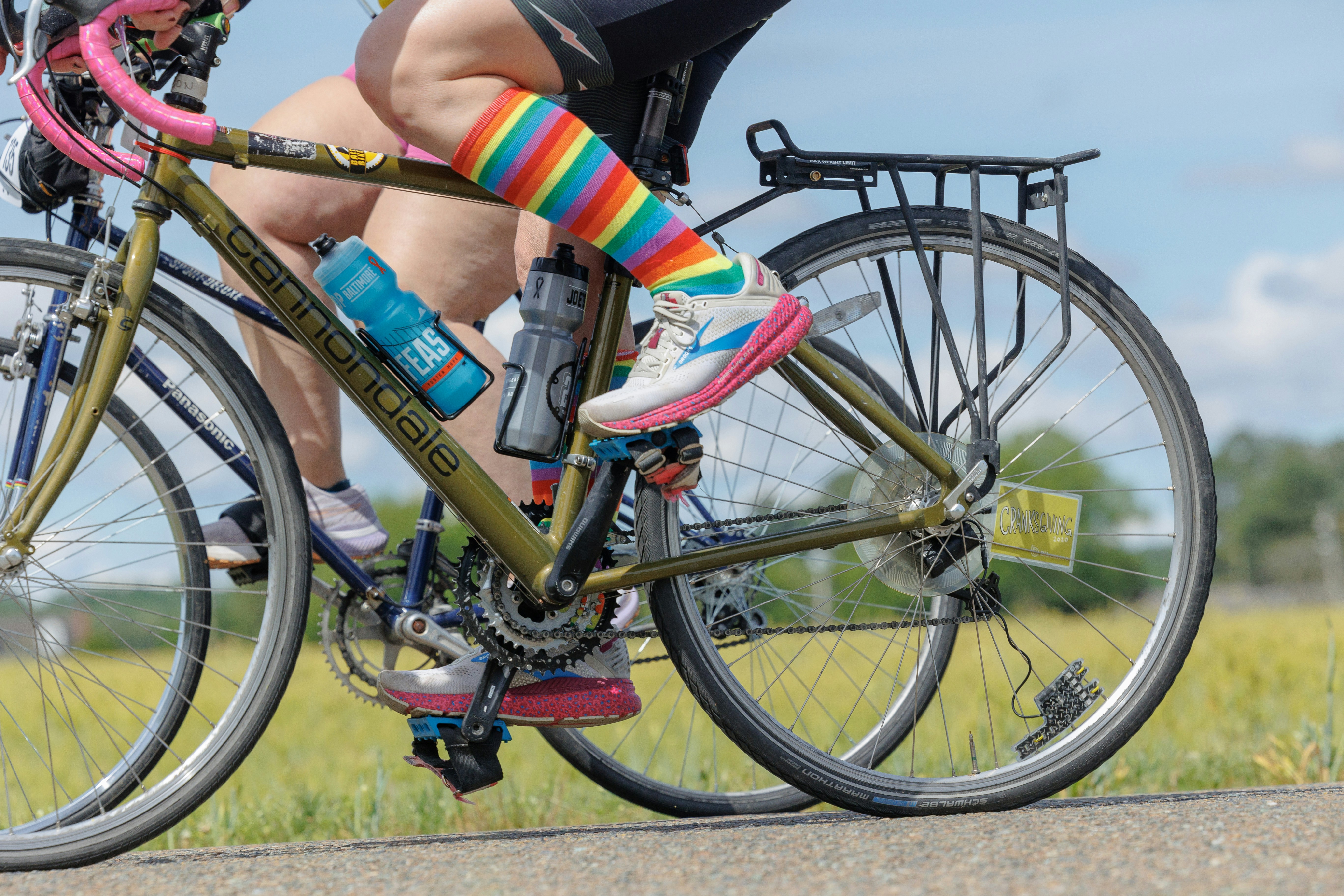 Cyclist riding a road bike outdoors in real conditions.