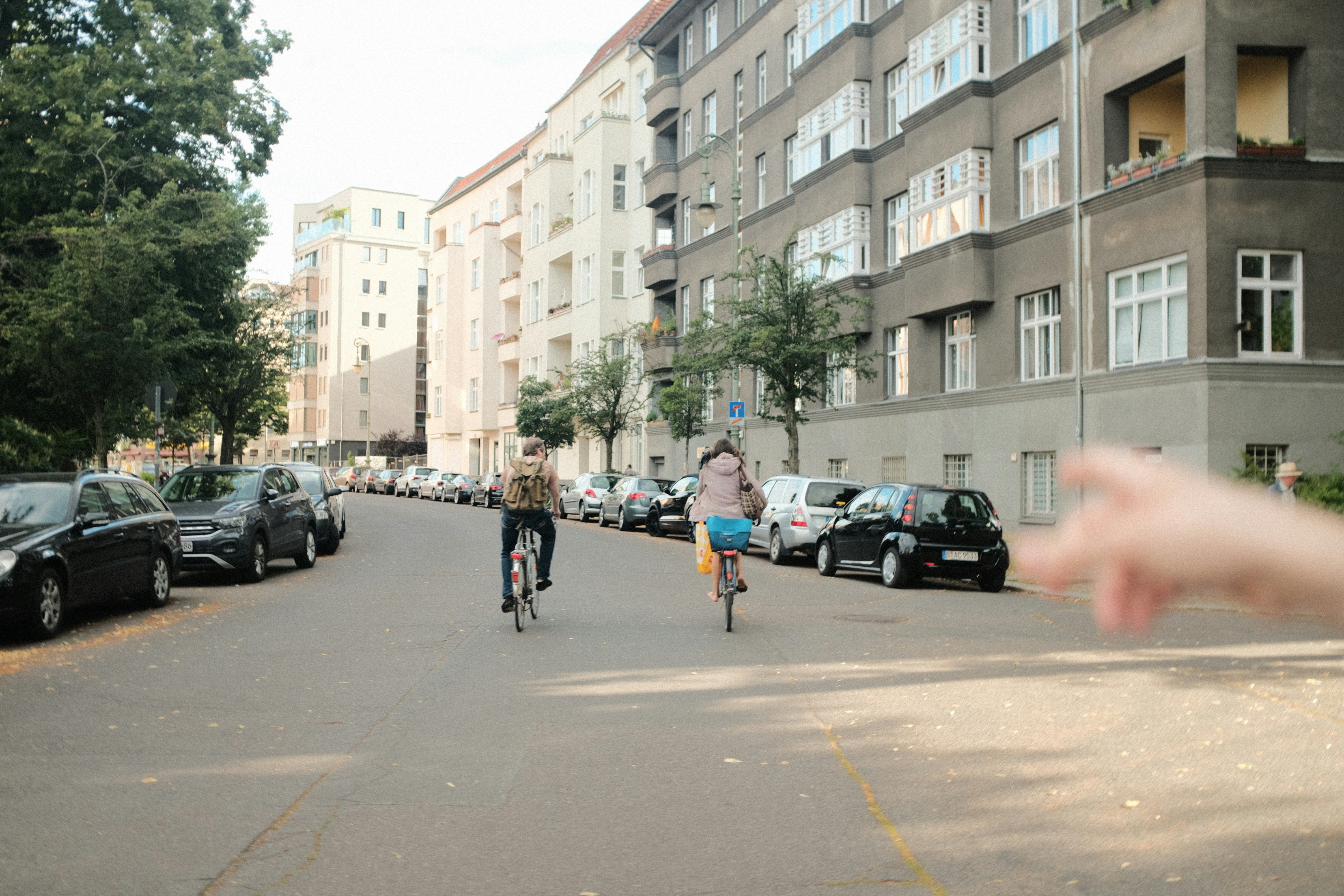 Cyclist riding a road bike outdoors in real conditions.