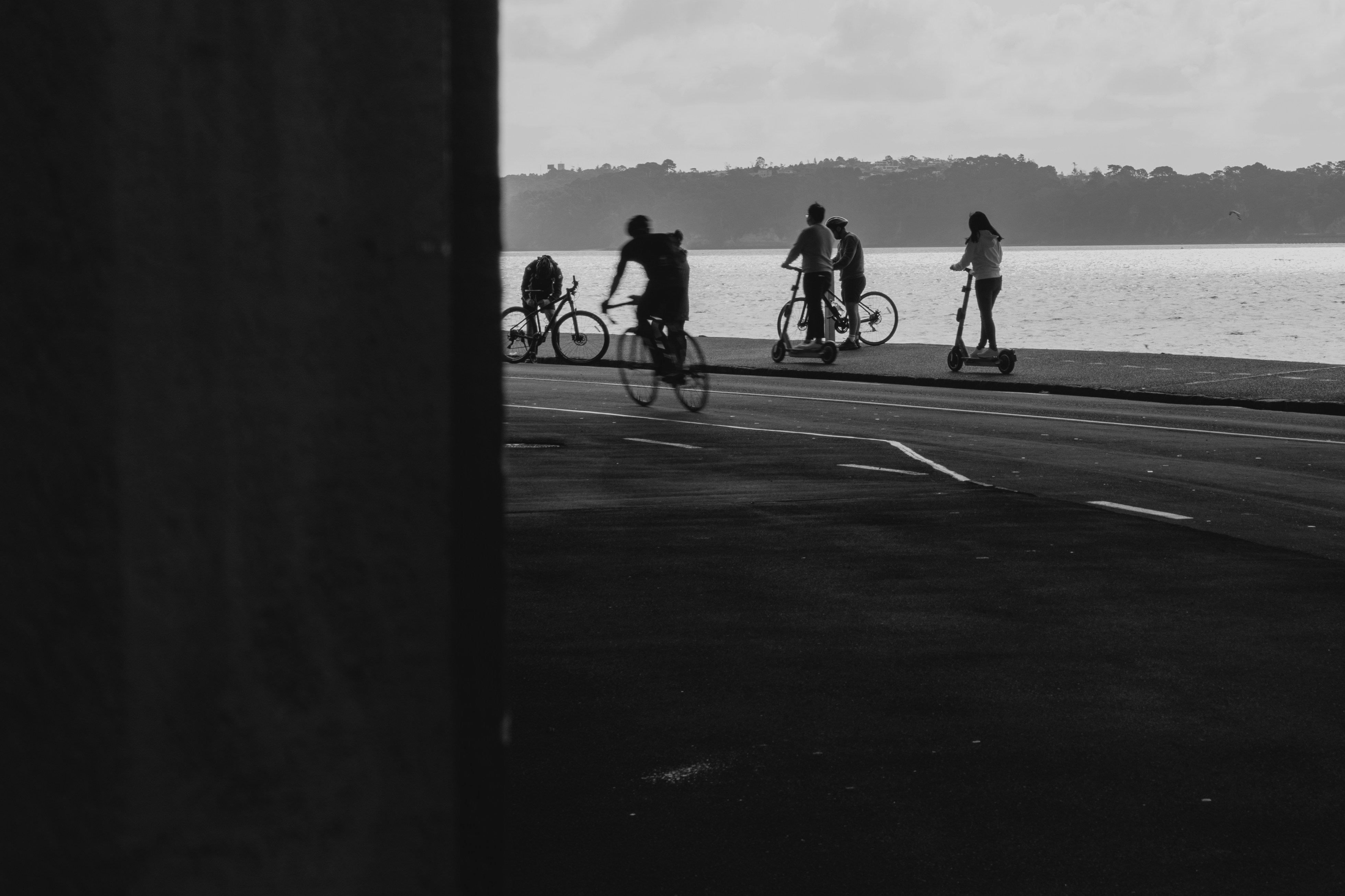 Cyclist riding a road bike outdoors in real conditions.