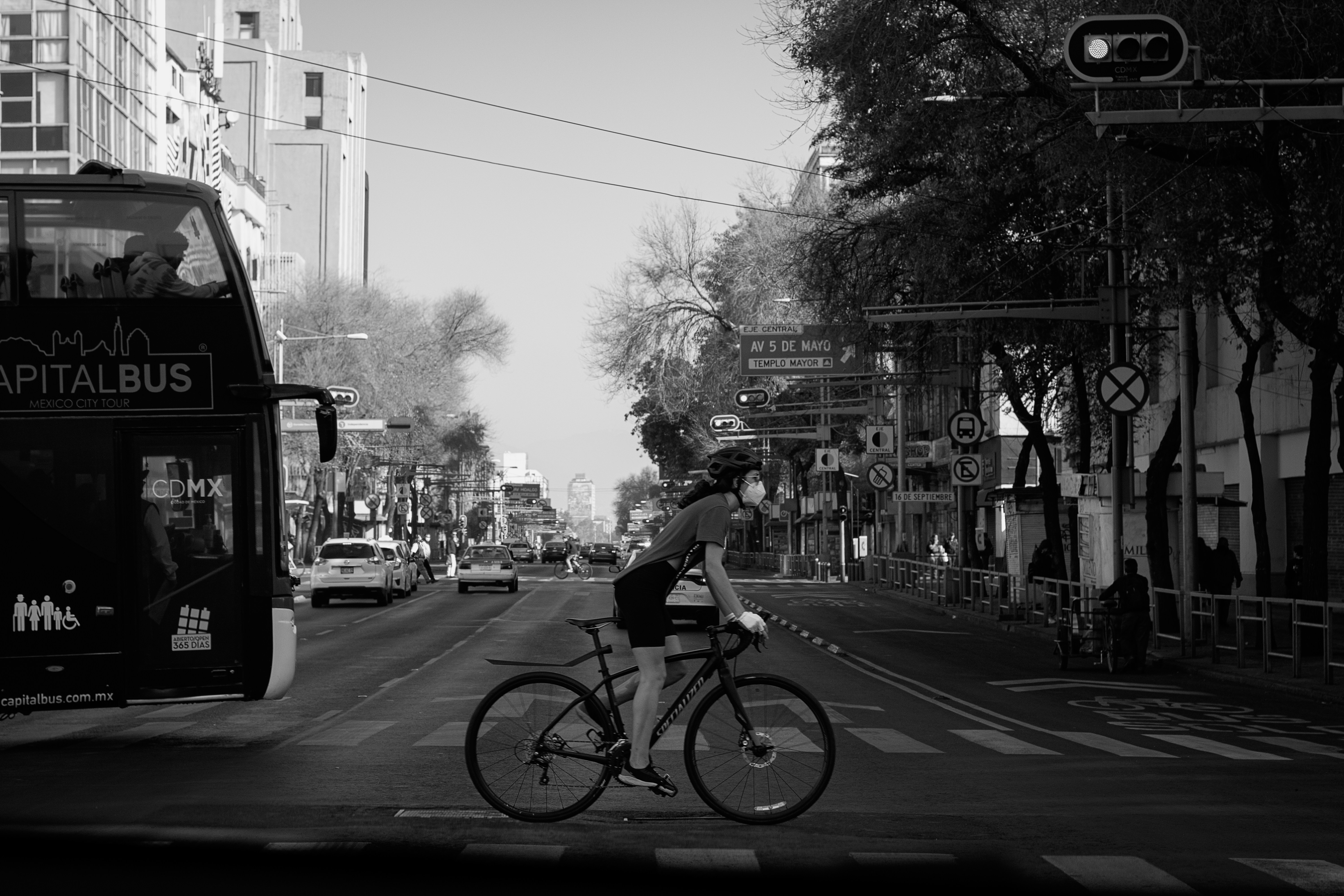 Cyclist riding a road bike outdoors in real conditions.