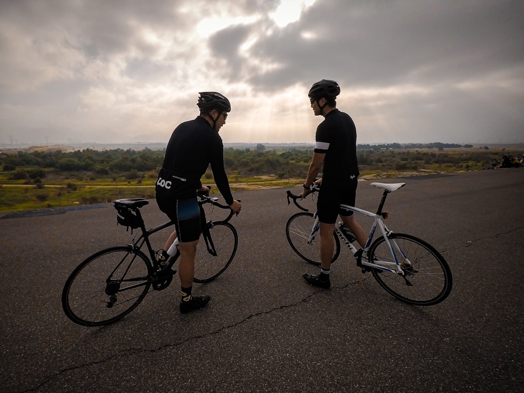 Group of cyclists on an endurance ride in morning light.