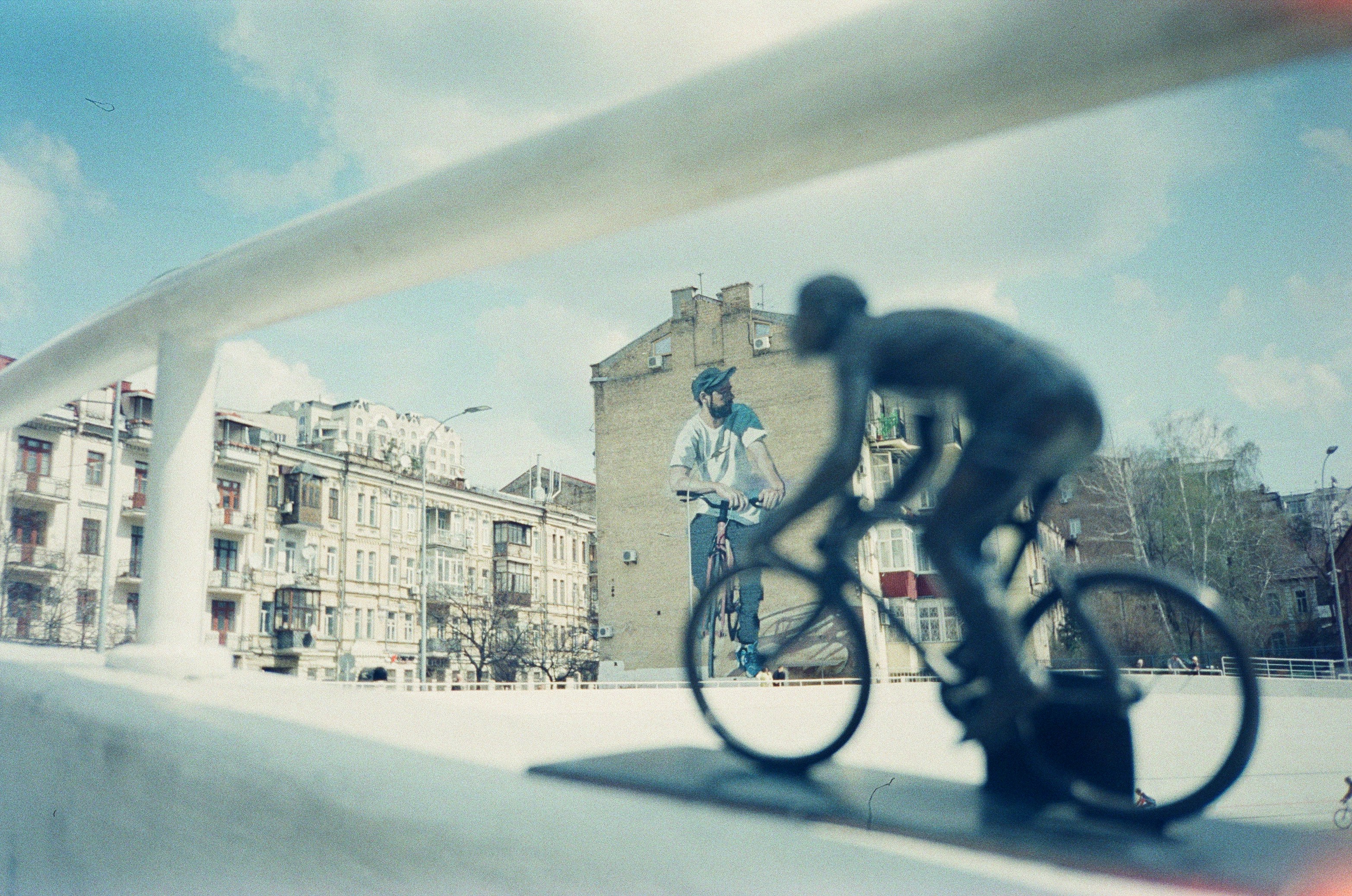 Cyclist riding a road bike outdoors in real conditions.