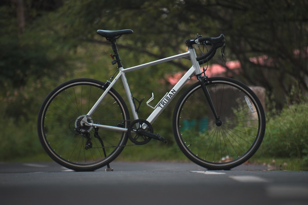 Group of road cyclists riding together outdoors on paved roads.
