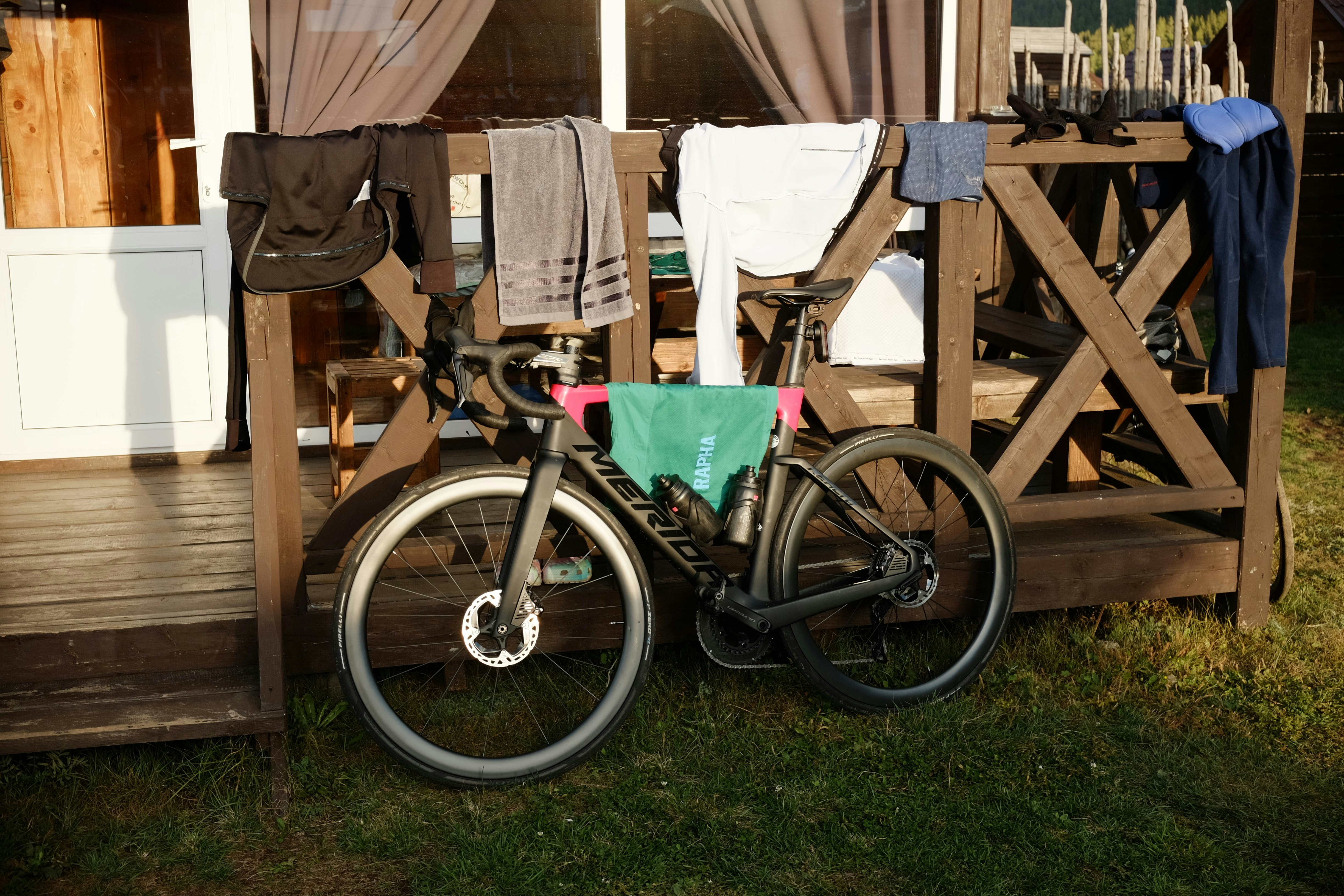 Cyclist riding a road bike outdoors in real conditions.