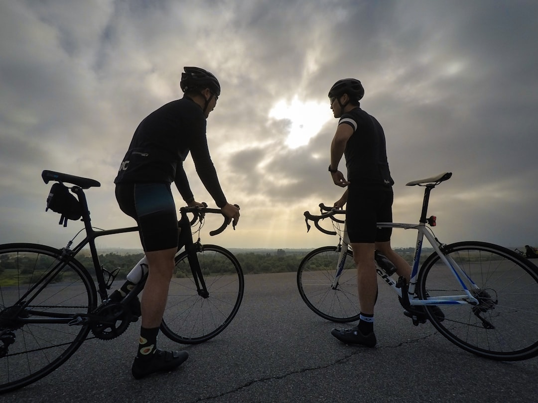 Group of cyclists on an endurance ride in morning light.