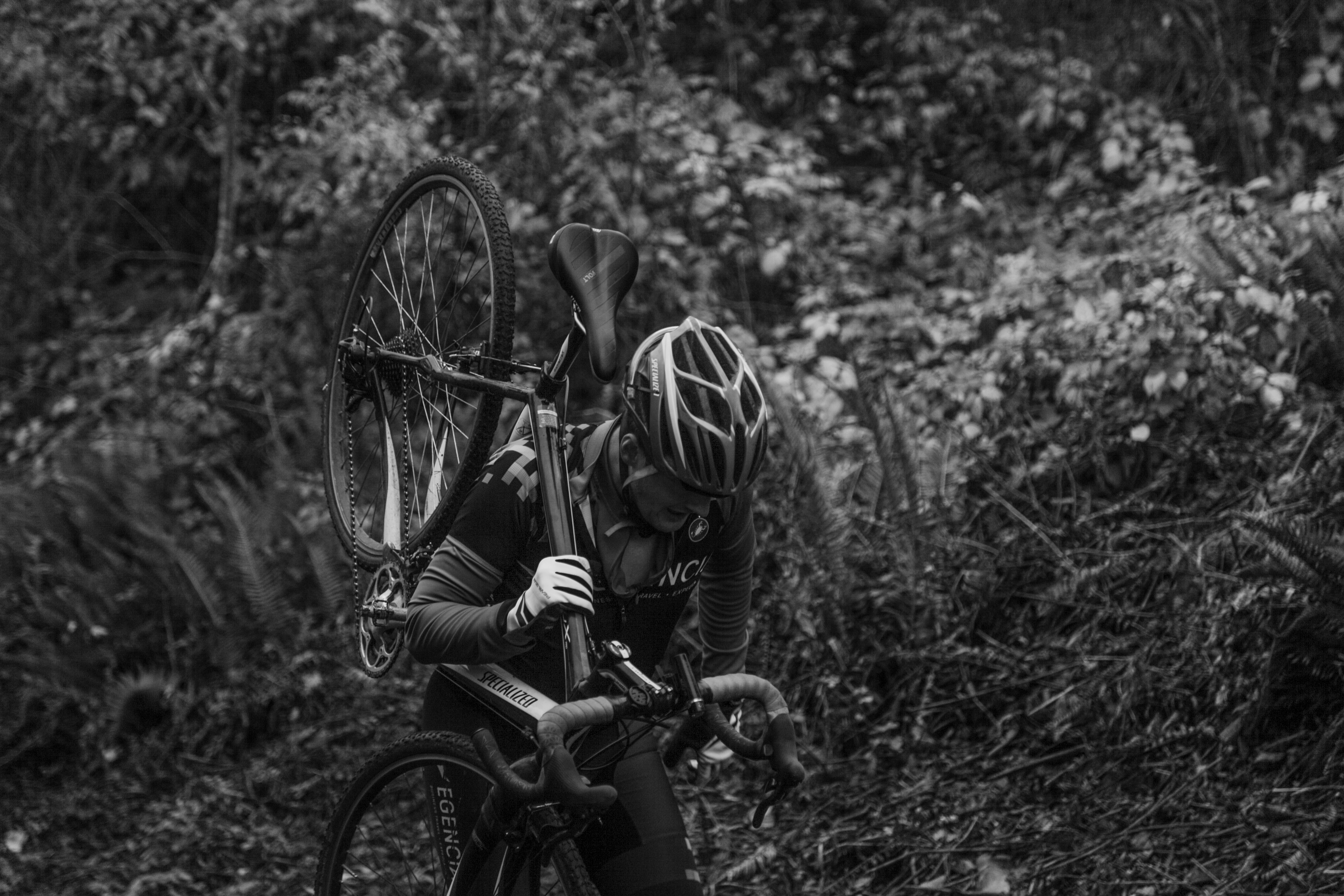 Cyclist riding a road bike outdoors in real conditions.