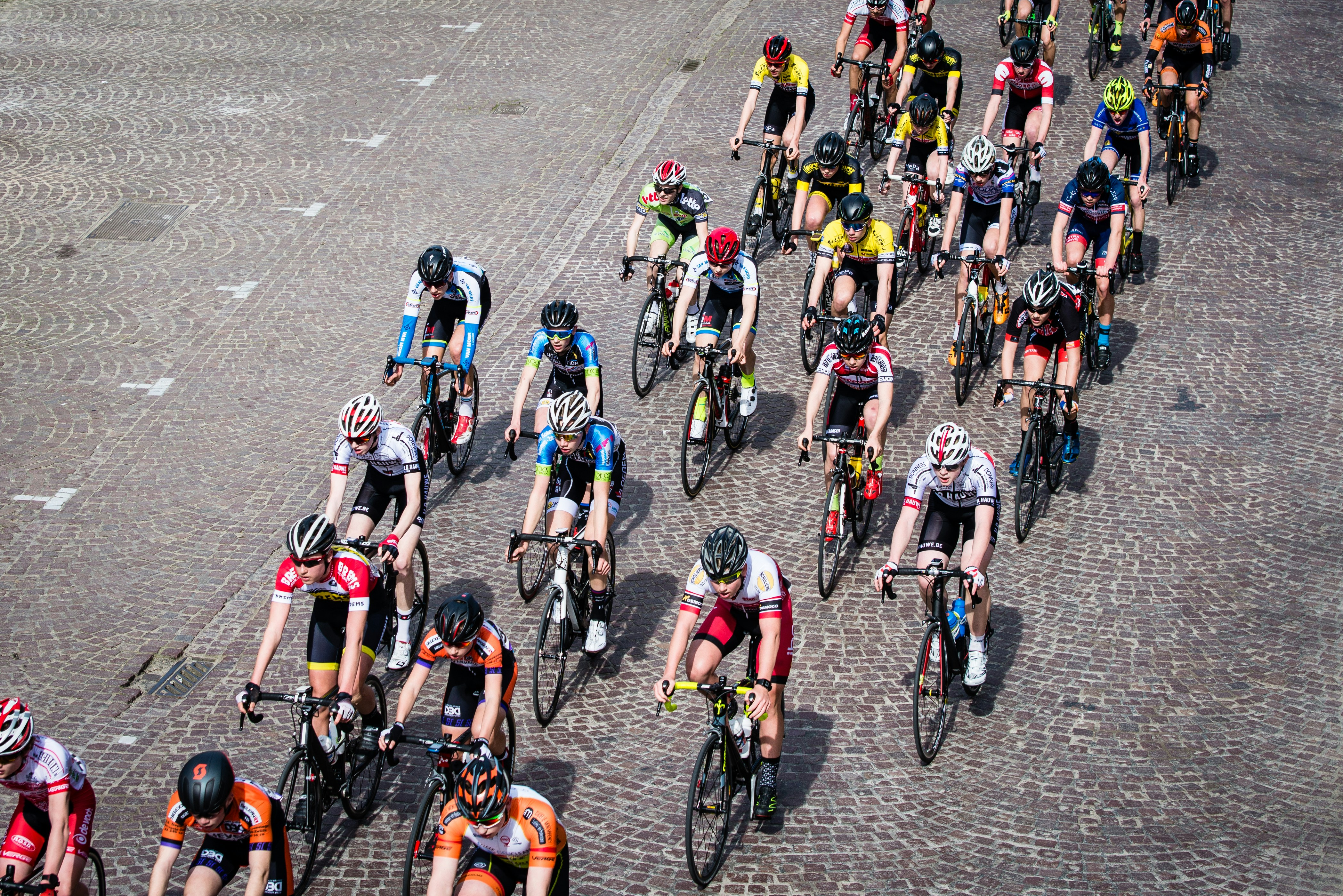 Cyclist riding a road bike outdoors in real conditions.