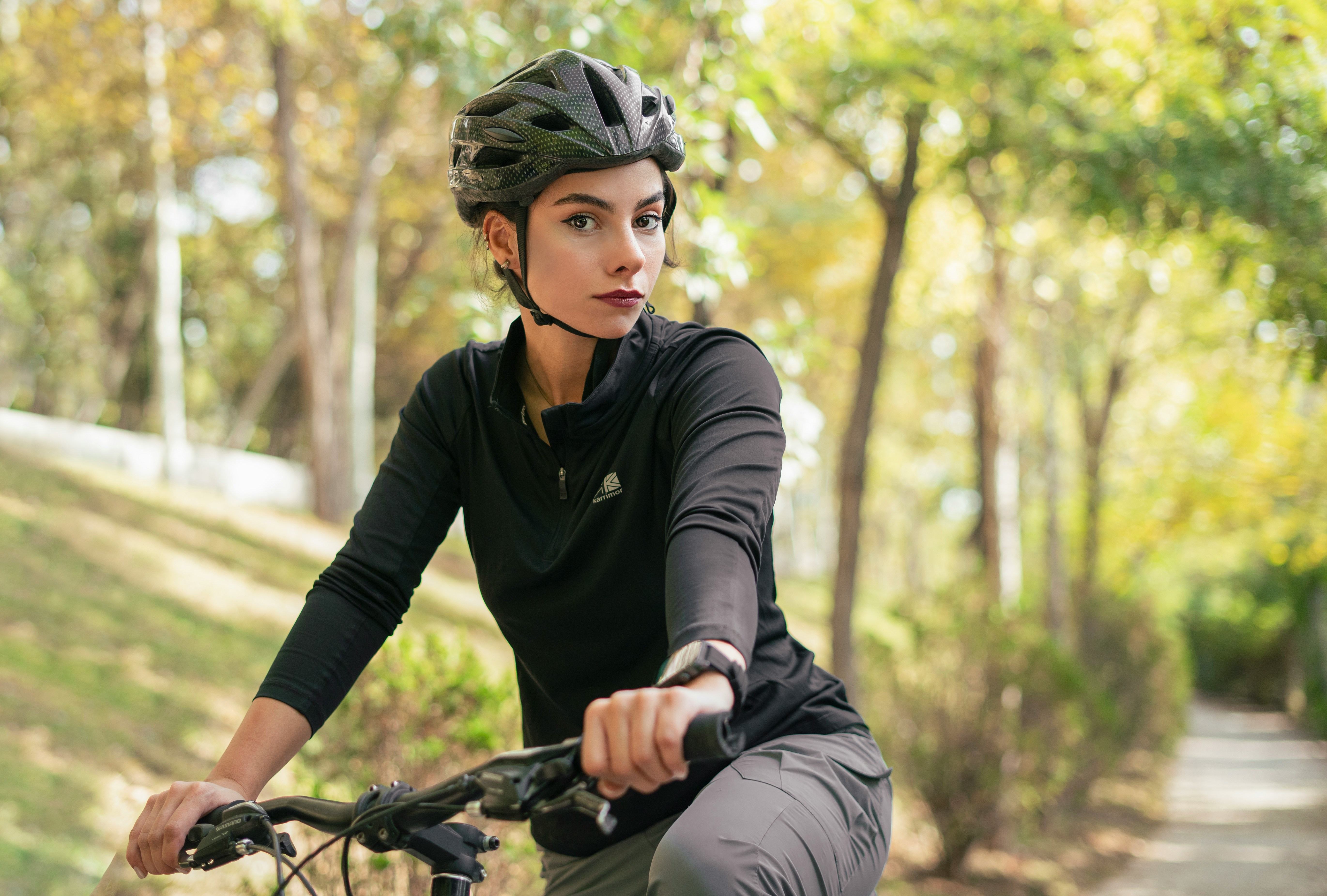 Cyclist riding a road bike outdoors in real conditions.