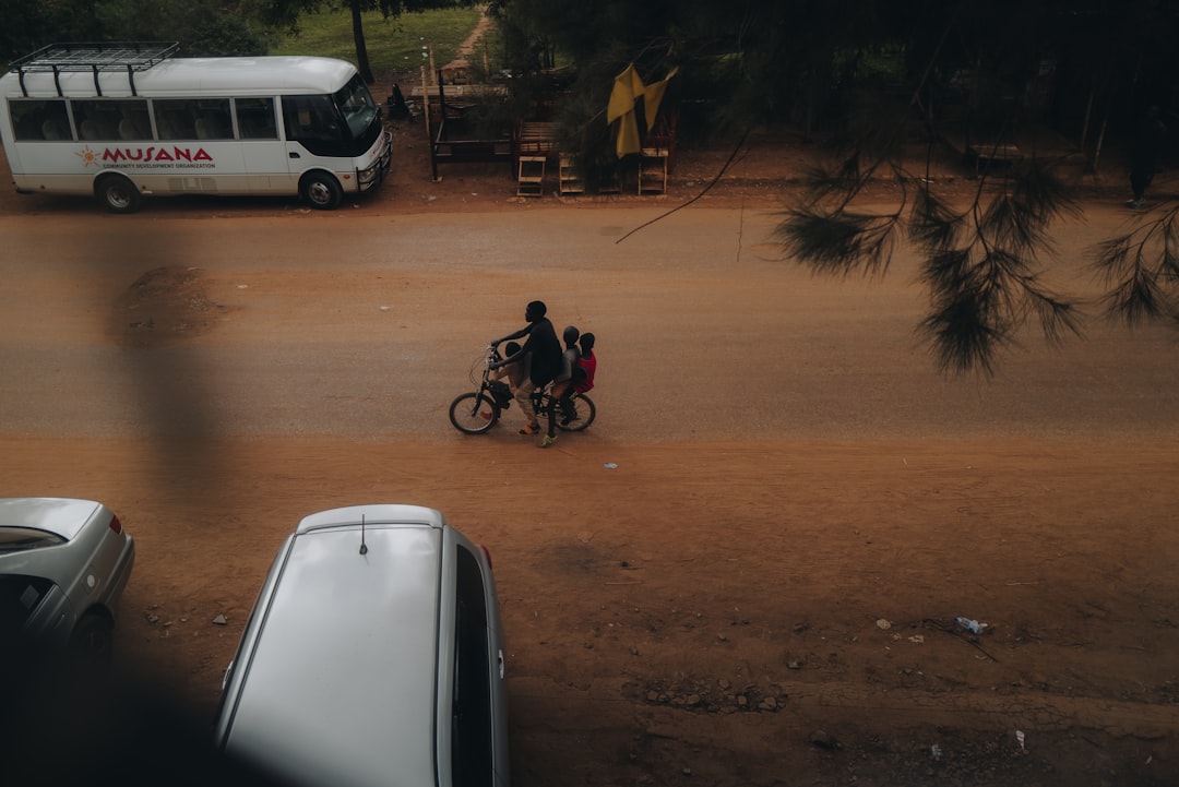 Group of road cyclists riding together outdoors on paved roads.