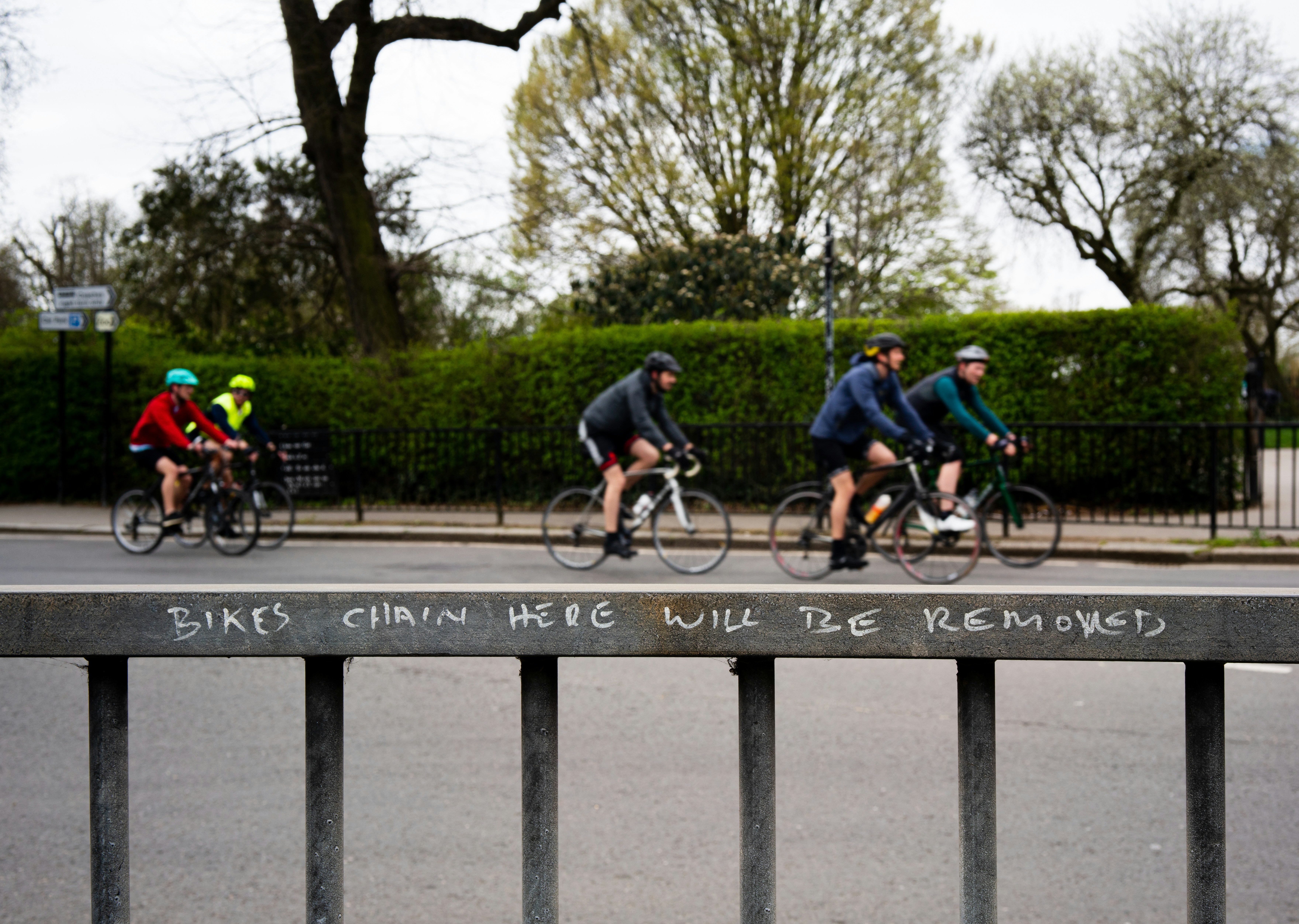 Cyclist riding a road bike outdoors in real conditions.