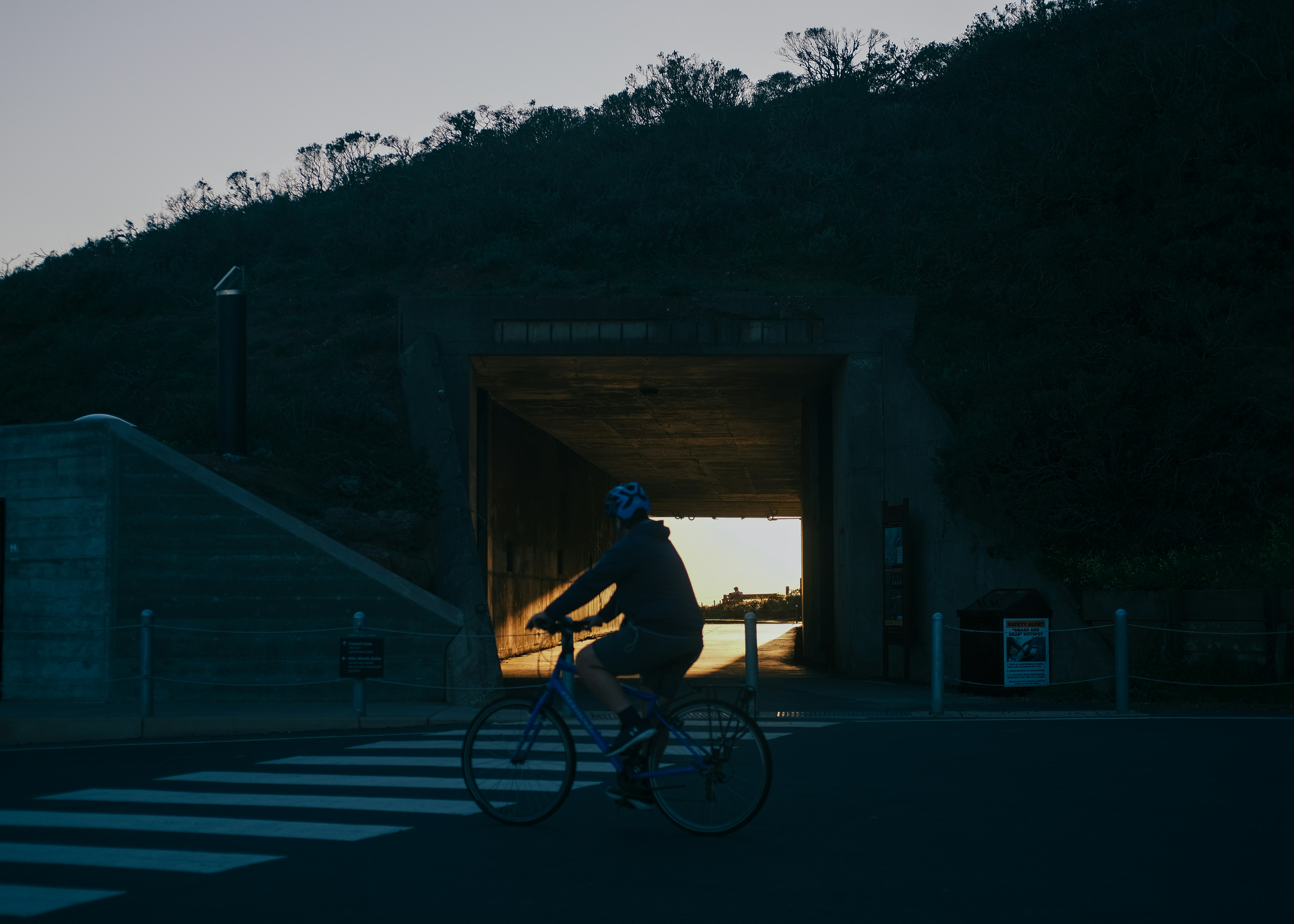 Cyclist riding a road bike outdoors in real conditions.