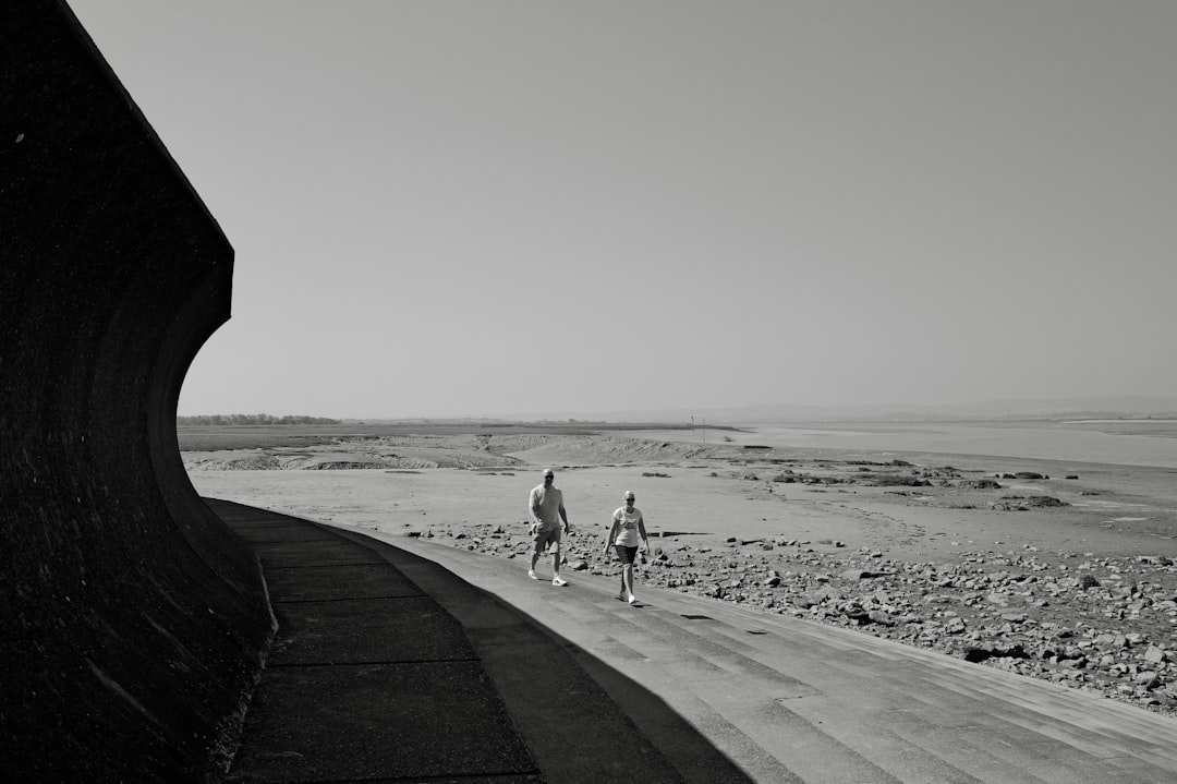 Group of road cyclists riding together outdoors on paved roads.