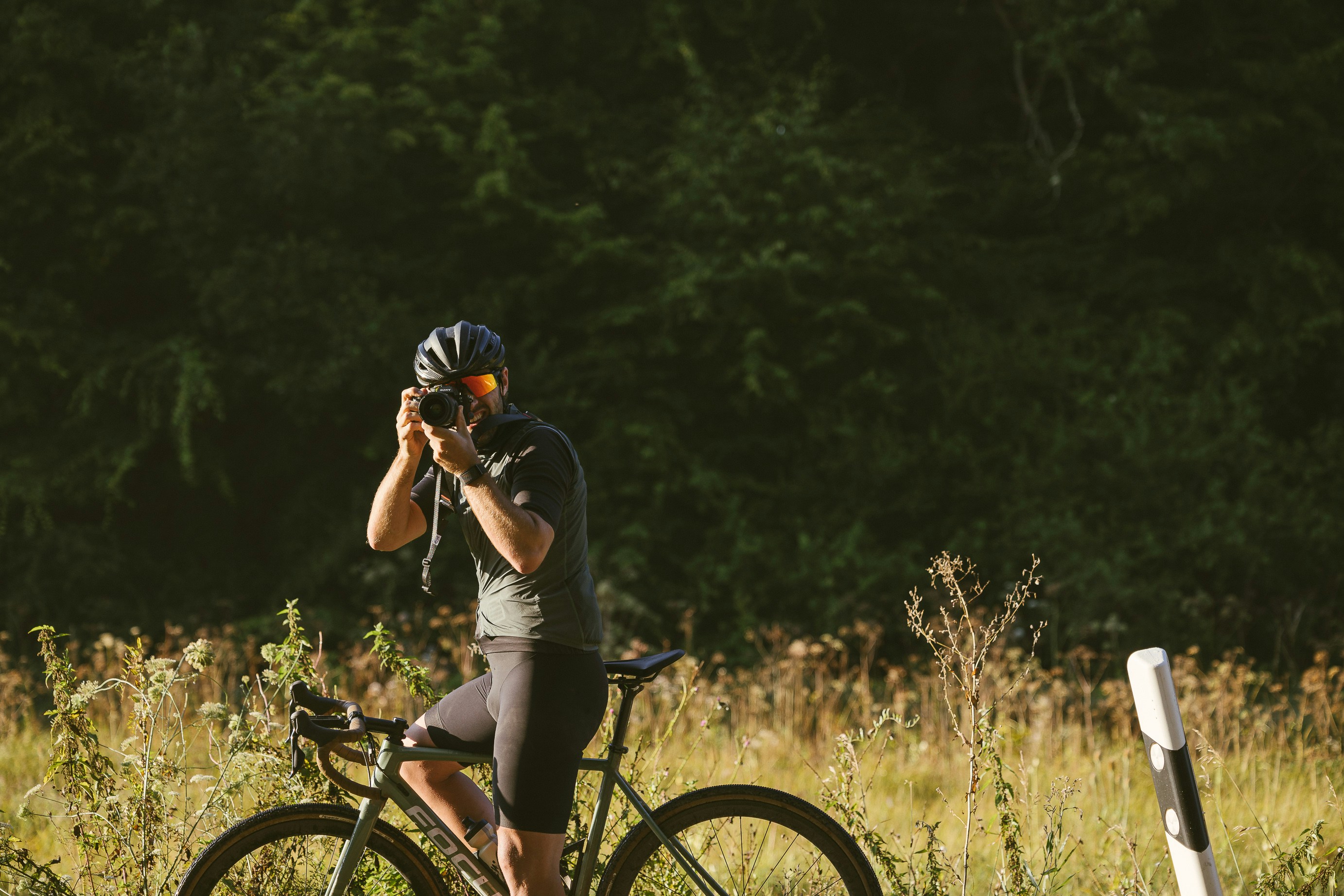 Cyclist riding a road bike outdoors in real conditions.