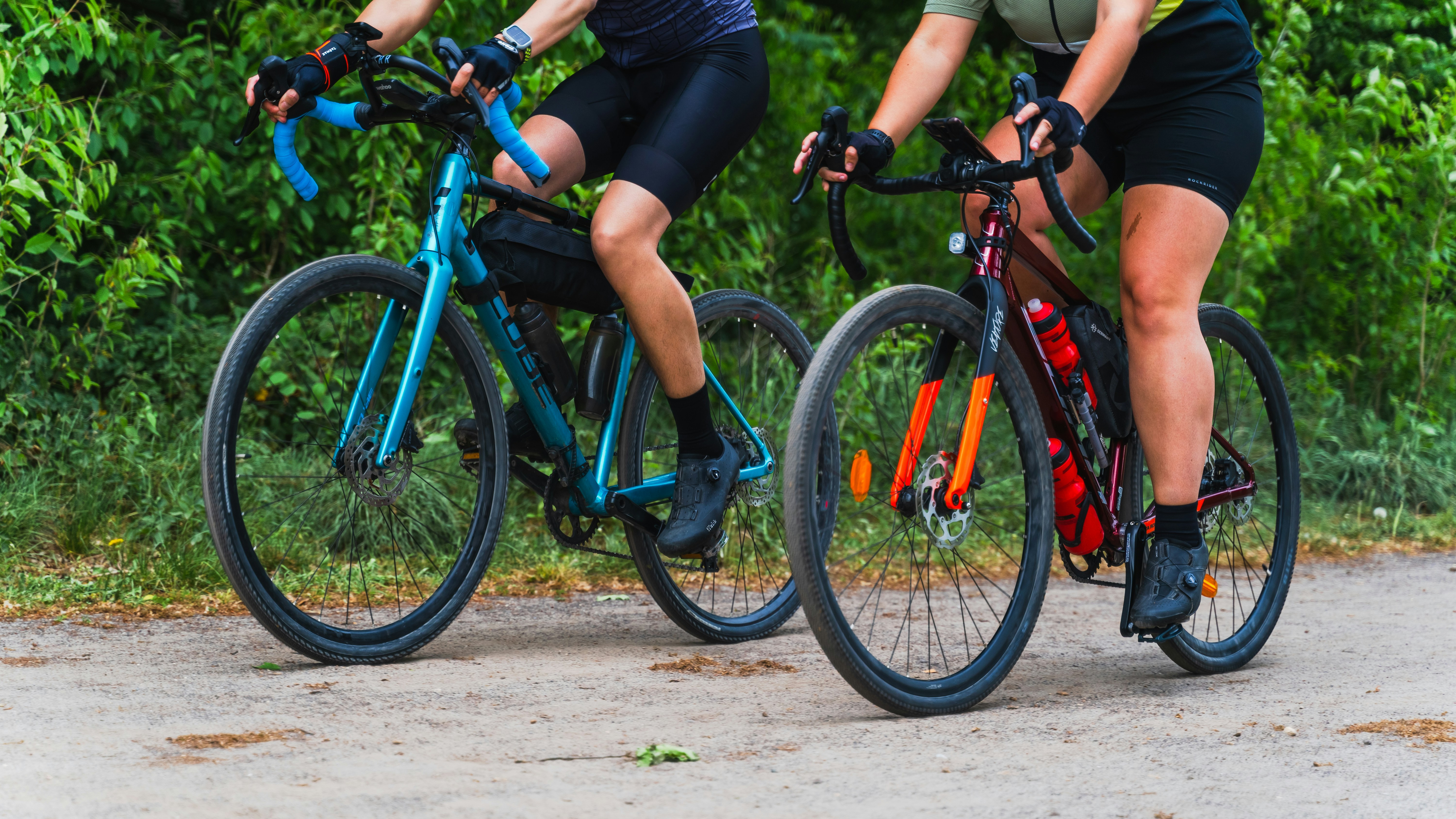 Cyclist riding a road bike outdoors in real conditions.